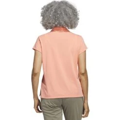 Adidas 2023 Women's Go-To Heathered Polo -Golf World Shop adidas 23 womens go to heathered polo coral fusion back itempicture